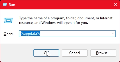 A screenshot of the Windows "Run" window, with %appdata% entered in the Run field and the mouse hovering over the OK button.